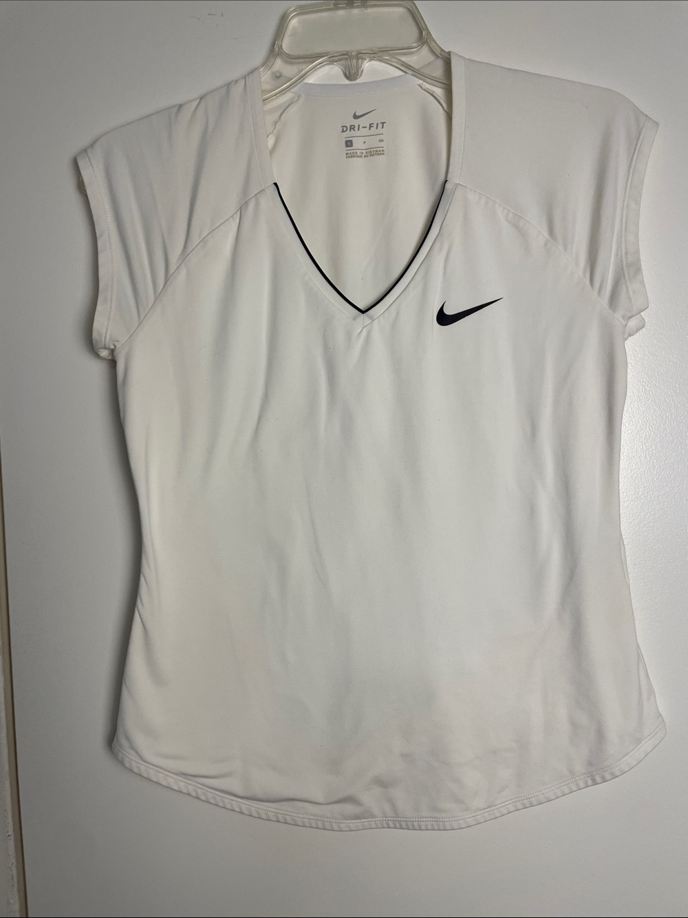 Nike White Dri-FIT V-Neck Short Sleeve Athletic Top with Black Swoosh